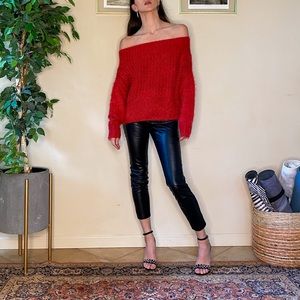 Off-the-shoulder red sweater by Honeybum